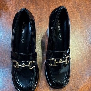 Unlisted Black Patent Heels with Gold Chain